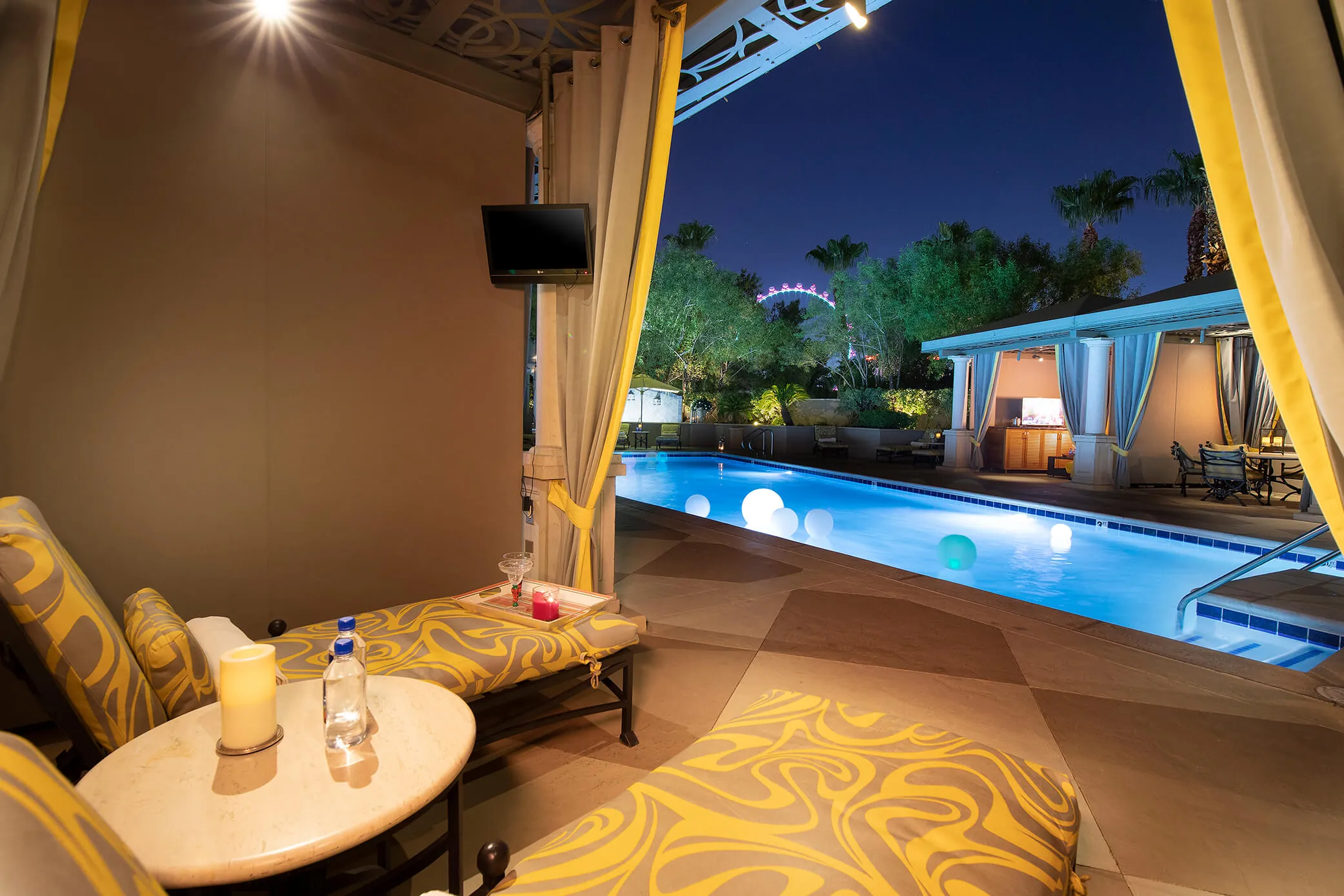 A poolside cabana at evening
