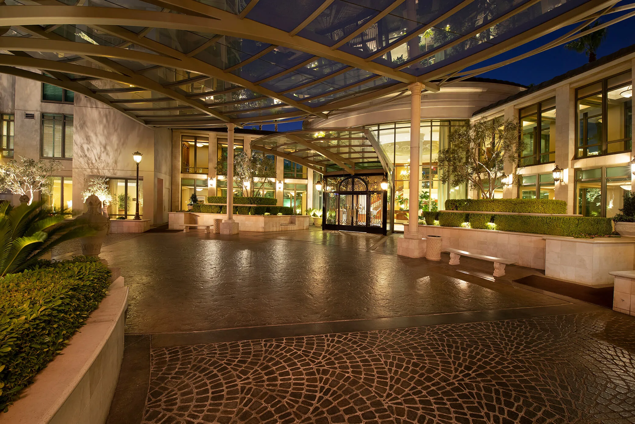 The porte-cochère entrance at dusk